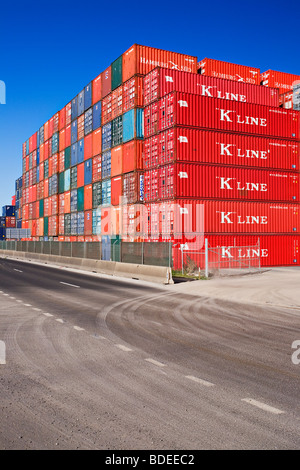 Shipping containers stacked at a commercial port Stock Photo - Alamy