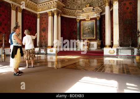 Tourists in the Peter the Great (Small Throne) Room in Winter Palace, St. Petersburg Stock Photo