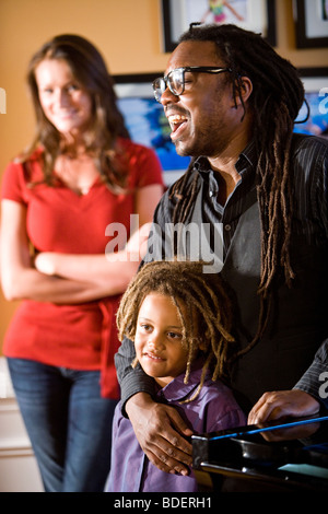 Interracial family at home Stock Photo