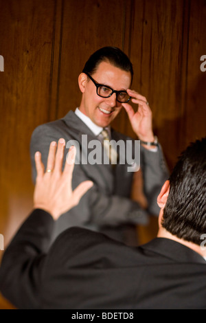 Vintage portrait of two businessmen in boardroom having discussion Stock Photo
