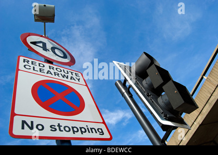 british red route clearway no stopping road sign, with 40mph speed limit sign, in west london, england Stock Photo