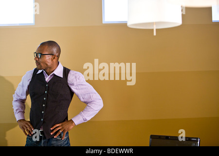 Casual African American businessman in boardroom Stock Photo