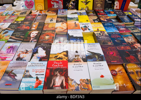 Greek language paperback books for sale at annual festival market at St Gerasimos Monastery on the island of Kefalonia Greece GR Stock Photo
