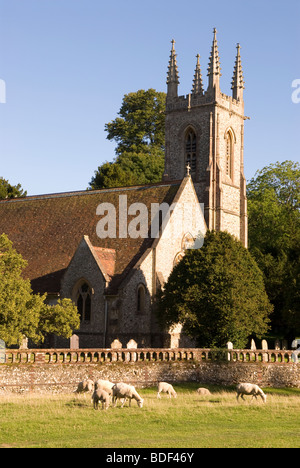 St Nicholas Church nestled between trees in the picturesque village of Chawton, near Alton, Hampshire UK. Stock Photo