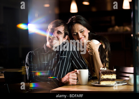 Young couple having dessert at a restaurant Stock Photo