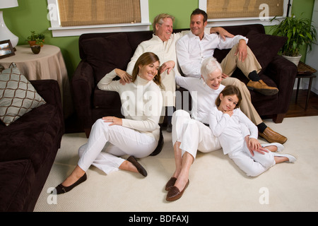 High angle view of multi-generational family posing in living room Stock Photo