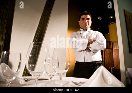 Professional chef standing in fine dining restaurant Stock Photo