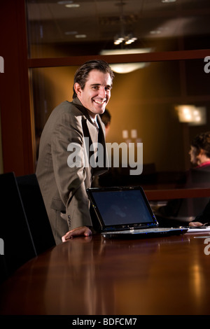 Portrait smiling businessman in conference room meeting Stock Photo - Alamy