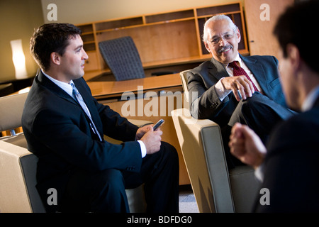 Hispanic business executives meeting in office Stock Photo