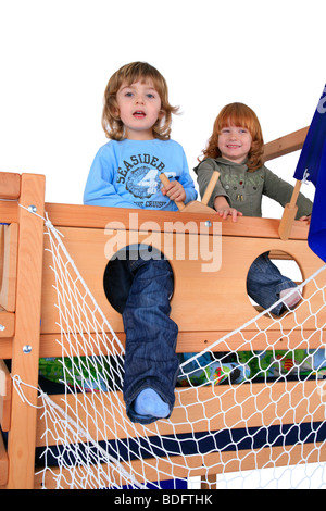 children playing sailors in a Billi-Bolli loft bett Stock Photo