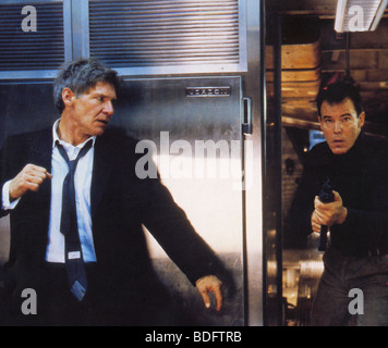 AIR FORCE ONE - 1997 Columbia film with Harrison Ford at left as President James Marshall Stock Photo