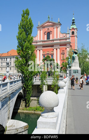 Ljubljana, Slovenia. Franciscan Church of the Annunciation and and Plecnik's Triple Bridge (Tromostovje) Stock Photo