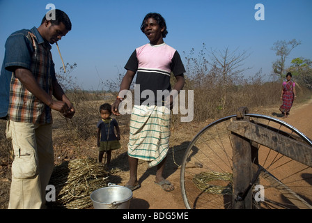 Workers in the road to Baripada, Orissa, India. Stock Photo