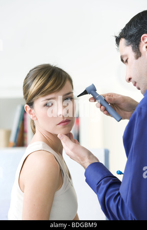 EAR NOSE & THROAT, WOMAN Stock Photo