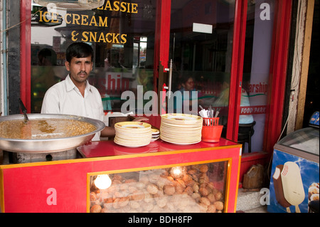 A man selling food snacks in Dhaka Bangladesh Stock Photo
