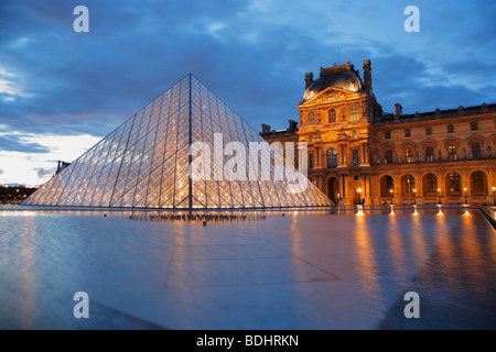 The Louvre Museum at night, Paris, France Stock Photo