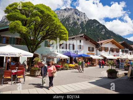 Shopping street in the centre of the town of Mittenwald with Karwendel Mountains in the Bavarian Alps Germany Europe Stock Photo