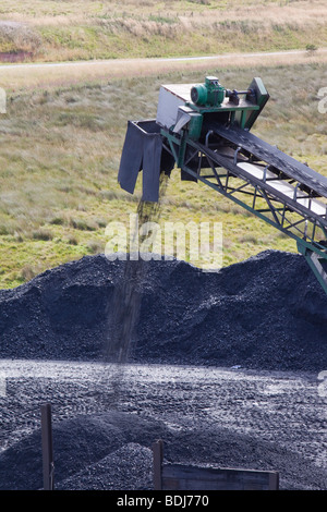 A conveyor belt that takes coal from the Glentaggart open cast coal mine to a road head for onward transport by road Stock Photo