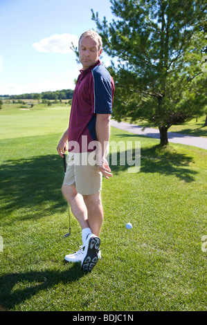 Golfer Cheating Stock Photo