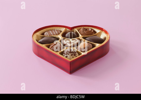 Still Life of Heart-Shaped Box of Chocolates Stock Photo