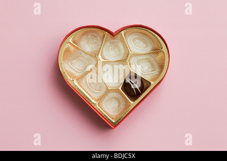 Still Life of Heart-Shaped Box of Chocolates Stock Photo