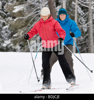 Close-up of Couple Cross Country Skiing, Whistler, British Columbia, Canada Stock Photo