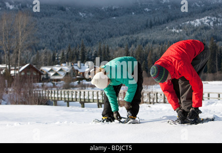 Couple Snowshoeing in Whistler, British Columbia, Canada Stock Photo