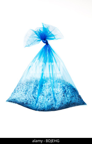 Blue Recycling Bag Full of Shredded Paper Stock Photo