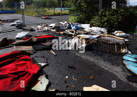 Rubbish illegally dumped on urban waste ground near Wolverhampton city centre Stock Photo