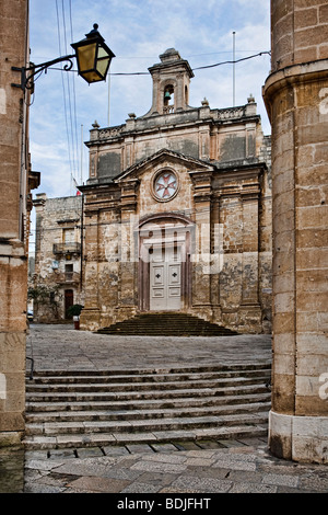 alley and church in a Maltese street Malta island Europe Mdina Stock Photo
