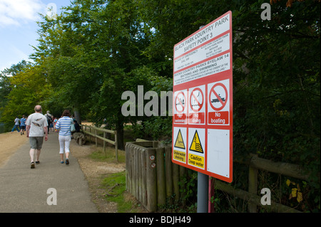 Warning notice by the lake at Black Park Country Park, Buckinghamshire, England Stock Photo