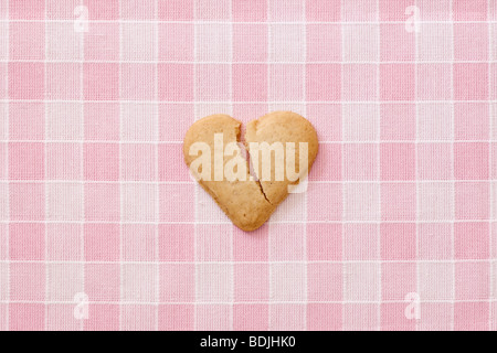 Broken Heart-shaped Cookie Stock Photo