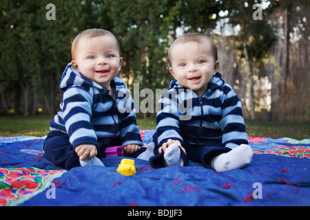 Twin Boys in Park Stock Photo