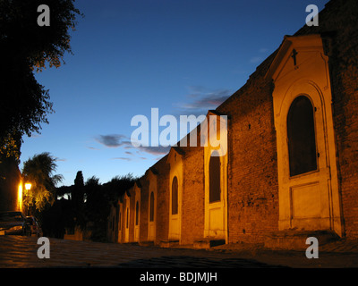 road side altars by san bonaventura church at night in rome italy Stock Photo