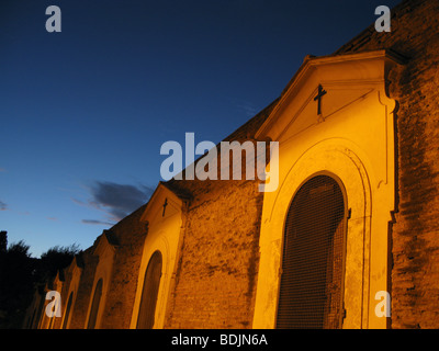 road side altars by san bonaventura church at night in rome italy Stock Photo