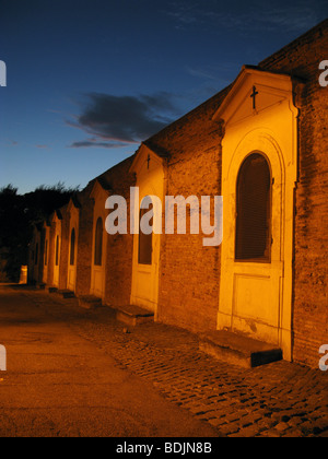 road side altars by san bonaventura church at night in rome italy Stock Photo