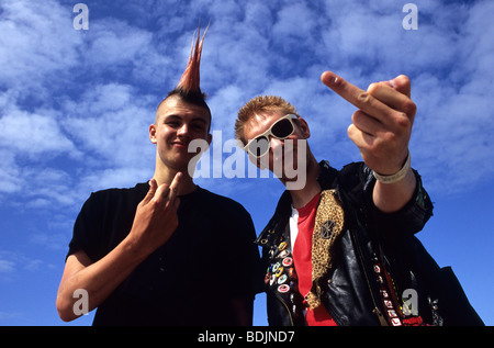 Two Punk Rockers Giving The Finger During The Annual Rebellion Festival At Blackpool Stock Photo