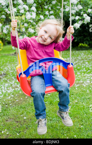 Little Girl on a Swing Stock Photo