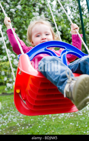 Little Girl on a Swing Stock Photo