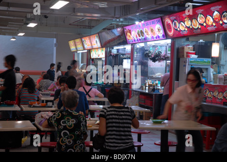 people eating in a food court, Chinatown, Singapore Stock Photo