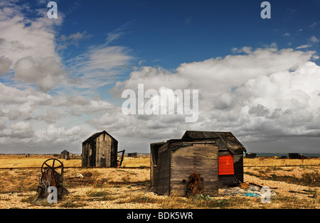 Abandoned fishermens wooden huts on the shingle at Dungeness in Kent ...