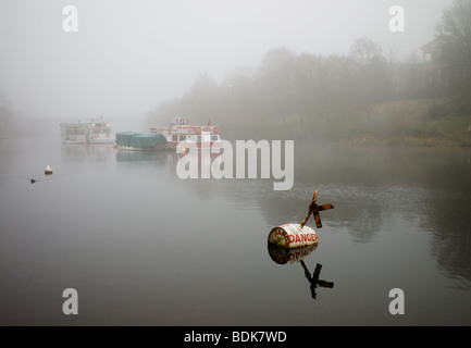 The river Dee in Chester on a misty morning Stock Photo