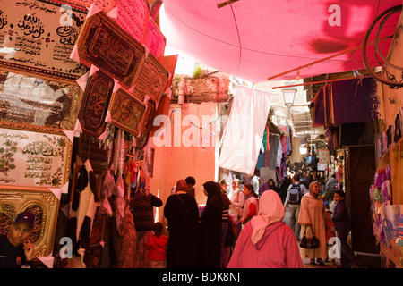 Fes, Morocco, shoppers in souk Stock Photo