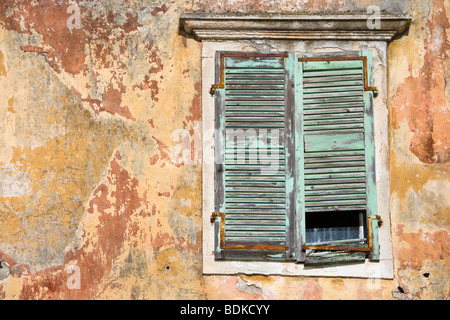 The run down facade of the former Governors House on the harbourside in Gaios, Paxos Island, Ionian Sea, Greece Stock Photo
