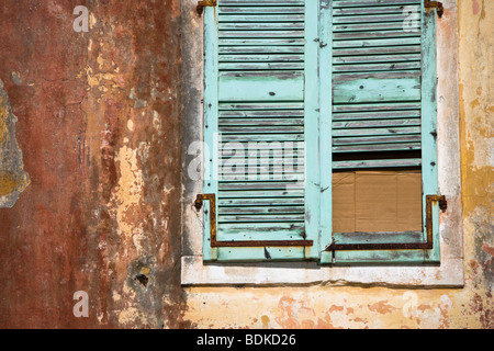 The run down facade of the former Governors House on the harbourside in Gaios, Paxos Island, Ionian Sea, Greece Stock Photo