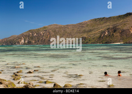 Indonesia, Lombok, Kuta, beach, children bathing in shallows