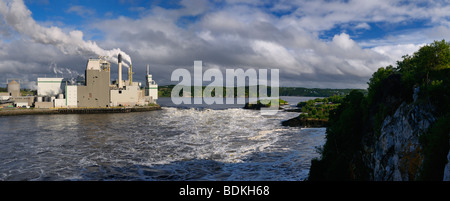 Panorama of Reversing Falls and pulp mill in Saint John New Brunswick at Bay of Fundy low tide Stock Photo