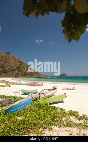 Indonesia, Lombok, South Coast, Selong Blanak, colourfully painted fishing boats on the beach Stock Photo