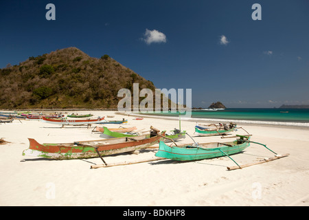 Indonesia, Lombok, South Coast, Selong Blanak, colourfully painted fishing boats on the beach Stock Photo