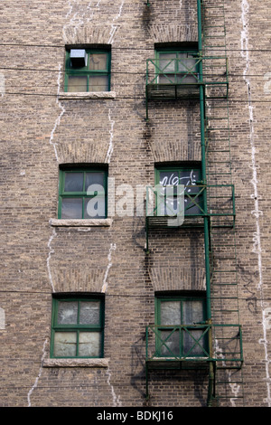 old-fashioned fire escape on brick building Stock Photo